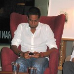 Khairy could not resist fondling his Blackberry during the event.