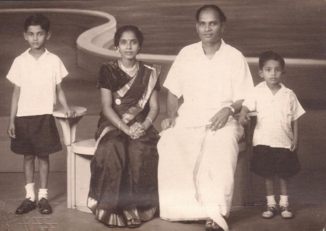 Mano with his younger brother, father and mother in 1951