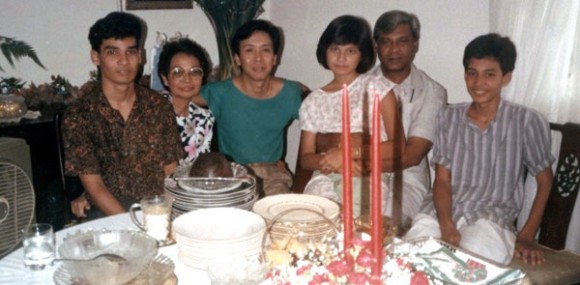 Christmas in Singapore. From left, brother Carl, mother, uncle, sister Lynette, and father. Hans is on the far right  