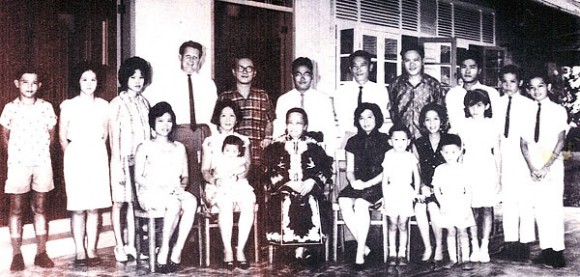 The Chan family with Ann’s Po po (seated, third from left), Ann’s mother (seated far left), father (standing, fourth from left), and her mother’s siblings