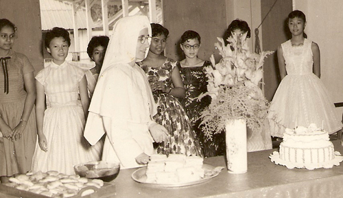 Rafidah at the Convent of the Holy Infant Jesus in Johor Baru. Rafidah at the immediate right of the nun.