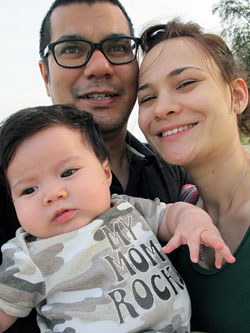 Aishah and her husband, Shaikh Abdul Shahnaz, with six-month-old Soraya in Penang on her first holiday