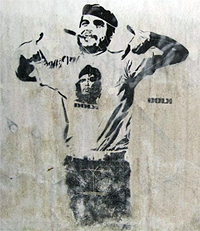 Graffiti depicting Fidel Castro wearing a Che Guevara T-shirt