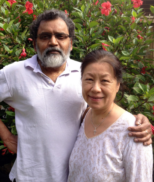 De Cruz and his wife Helen  in their Sydney garden. They will be flying back to vote (Courtesy of William de Cruz) 
